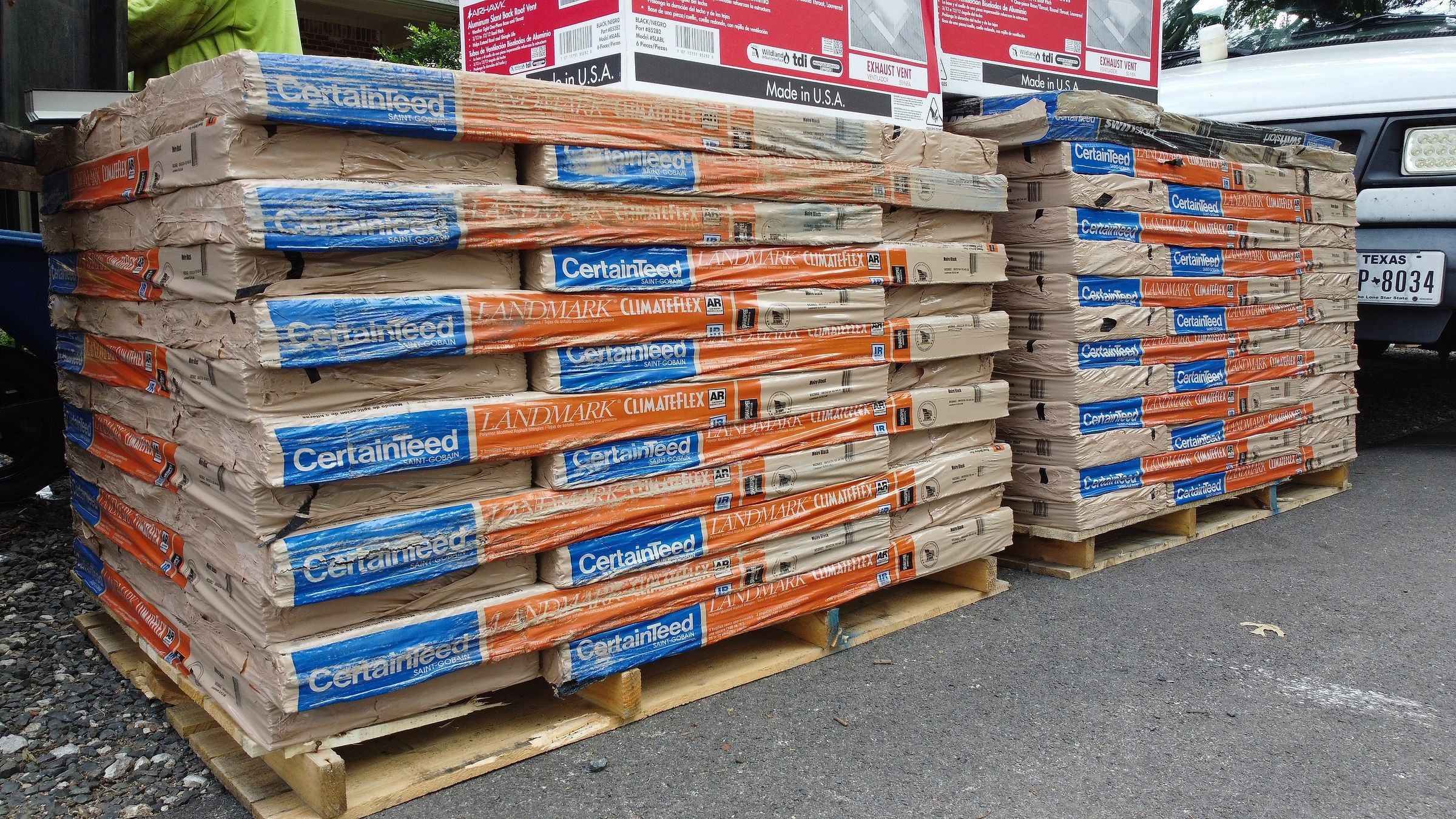 Pallets of CertainTeed ClimateFlex Class 4 impact-resistant shingles