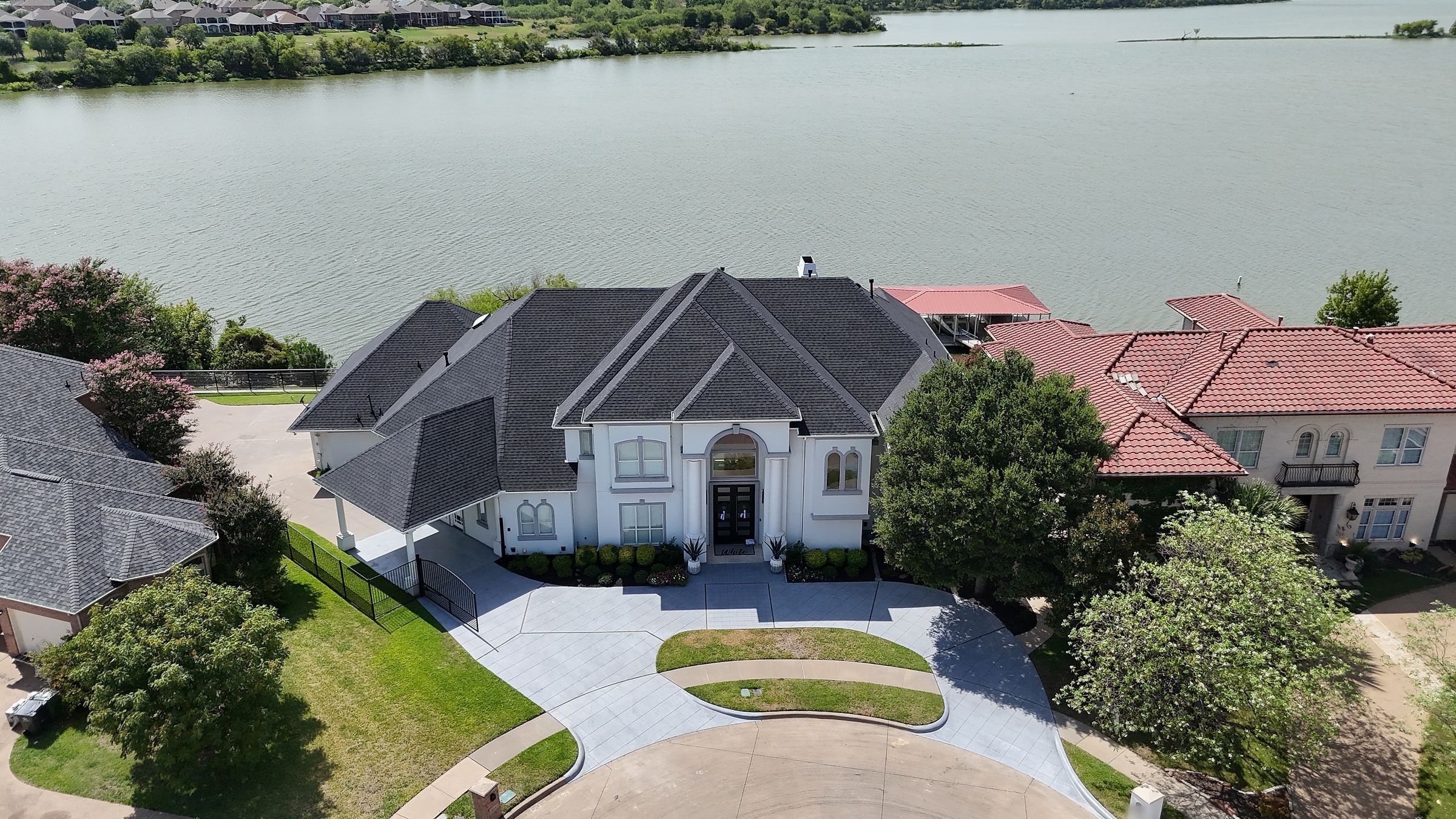 Finished shingle roof on a home overlooking Lake Arlington in Arlington, TX